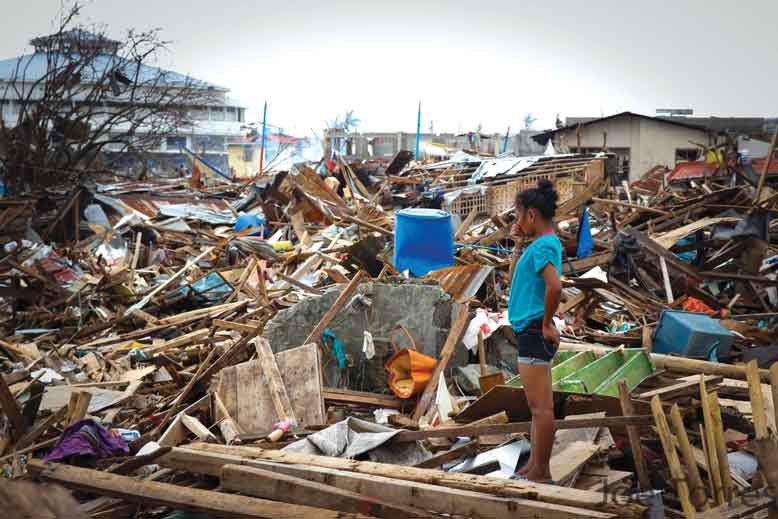 Haiyan survivors search for home amid the rubble