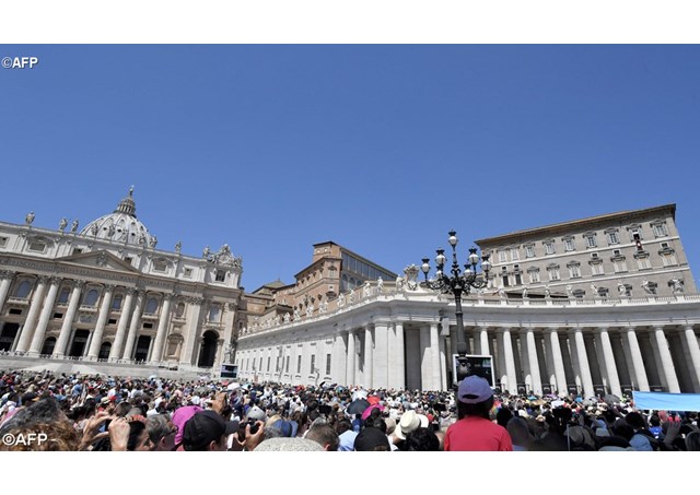 Pope Francis addresses the crowds gathered in St Peter's Square for the weekly Angelus. - AFP
